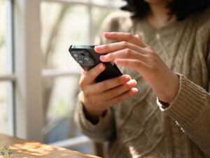 woman looking at her phone