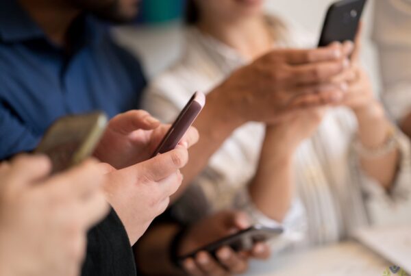 multiple people on their phones