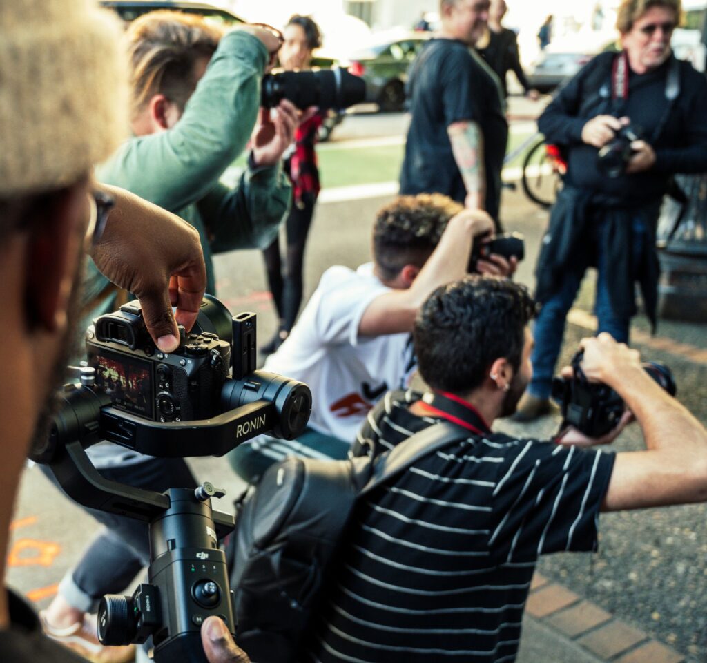 photographers taking pictures of unknown subject